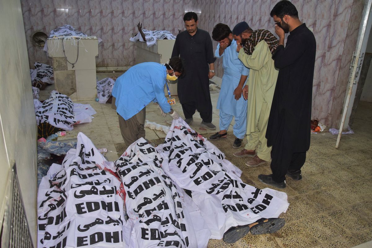 A suicide bombing near a political rally in southwestern Pakistan kills 13 and wounds 30