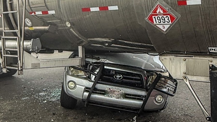 Toyota Tacoma driver uninjured after truck wedged under diesel tanker in Fresno County