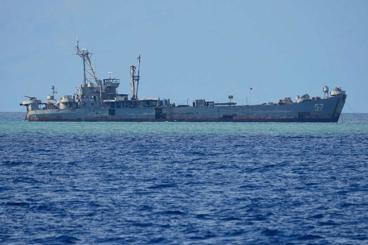 Philippine forces deliver supplies and personnel to disputed South China Sea shoal despite tensions