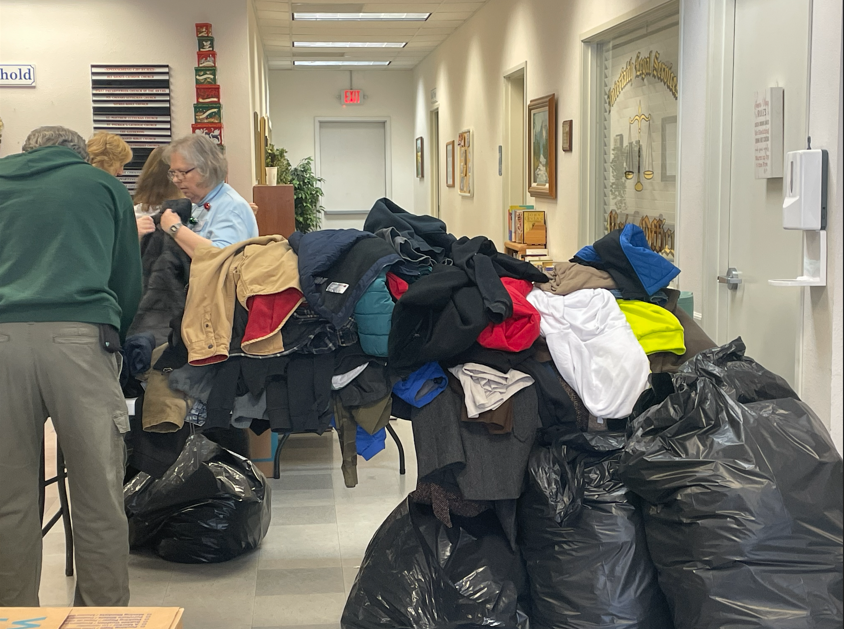 Community Donates Over 830 Coats To Interfaith