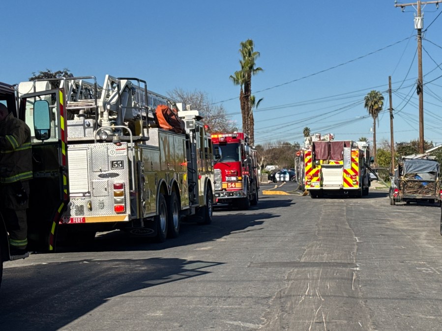 Visalia firefighters battle house fire, roads closed