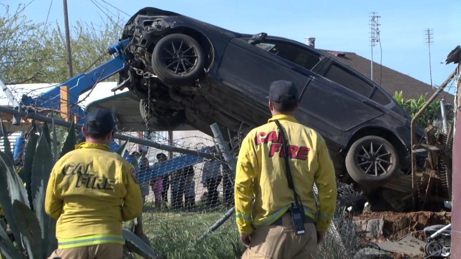Police explain the 'bizarre' crash that put a car on a roof in Atwater