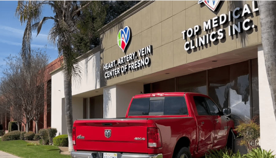 Truck crashes into building in Fresno