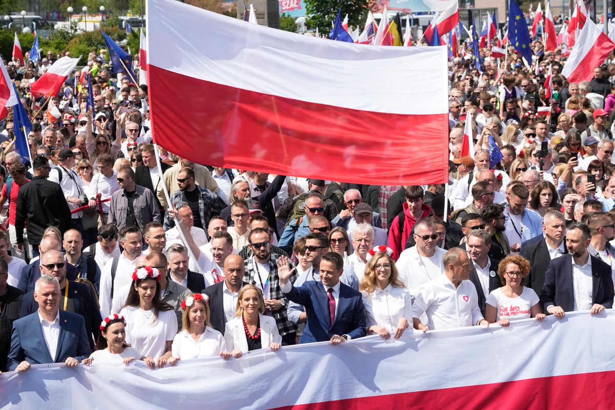 A look at the candidates running in Poland’s presidential runoff election