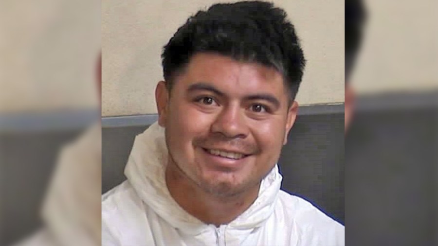 Fresno Police officer shown smiling in jail picture after his arrest